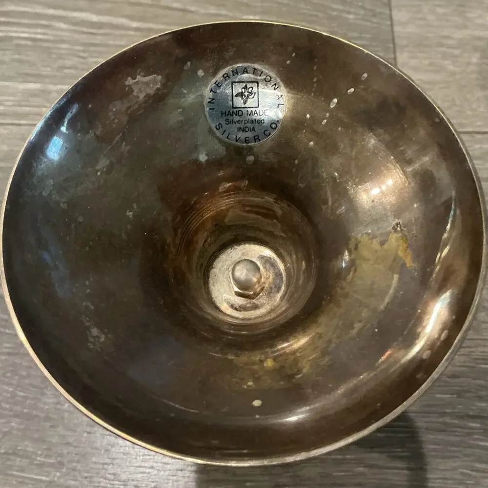 other silverplated candlestick